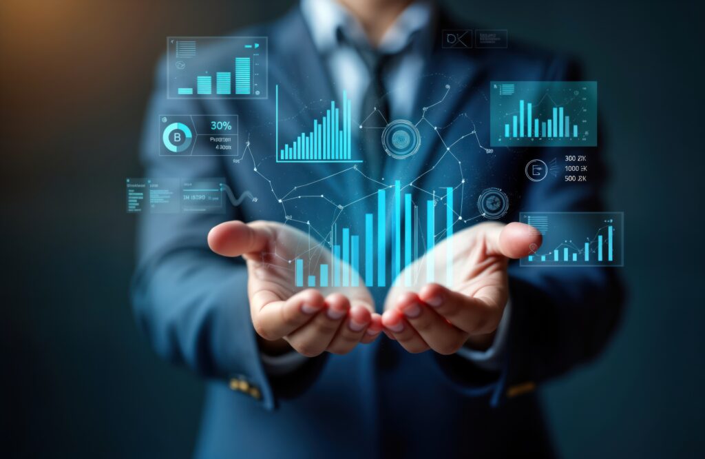 Geschäftsmann hält datengestützte technologische Einblicke, während moderne digitale Grafiken und Zahlen in seinen Händen schweben, symbolisiert Geschäftsstrategien und Entscheidungsfindung